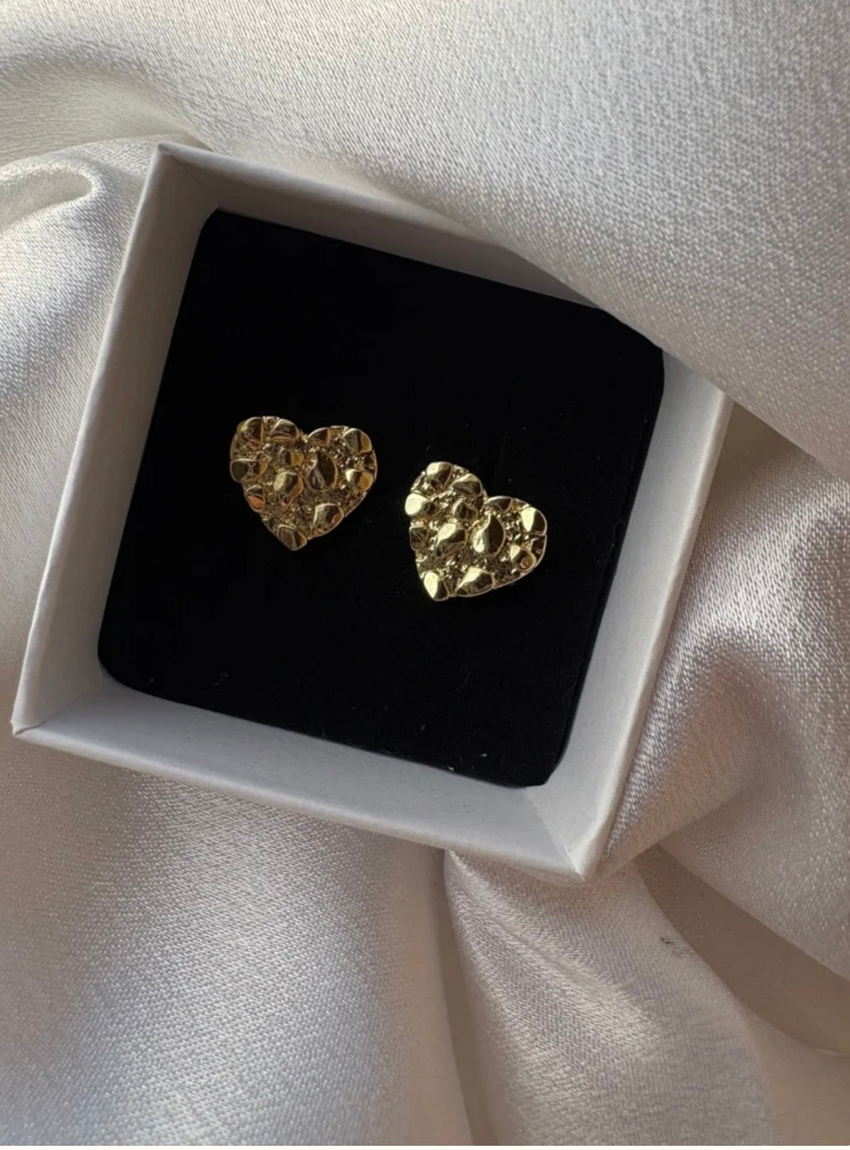 Earrings —>